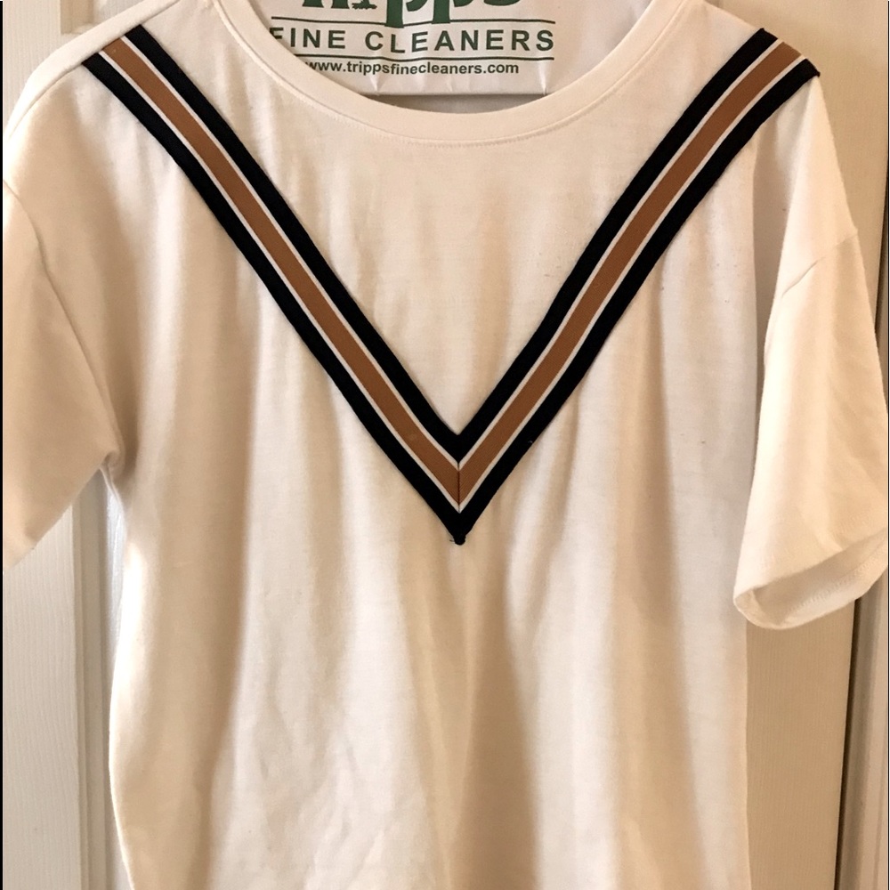 This shirt is new without tags. Super cute and extra soft fabric.